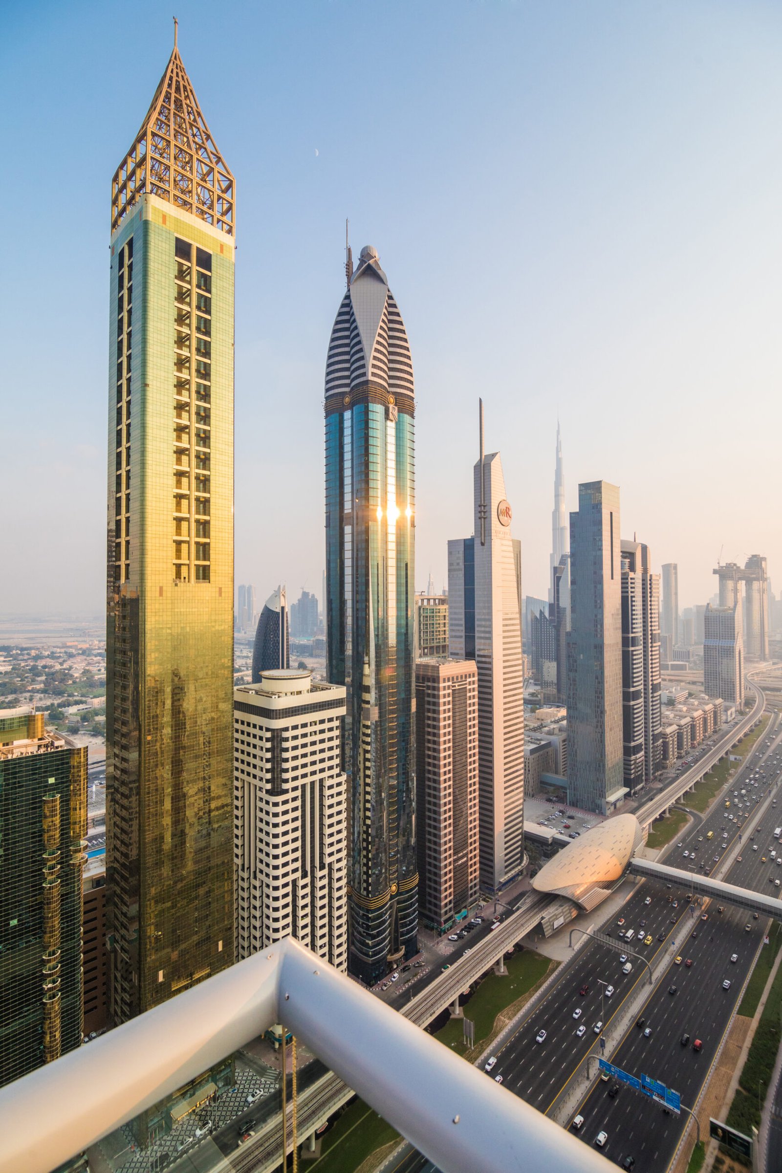 dubai, uae october, 2018. dubai skyline and downtown skyscrapers on sunset. modern architecture concept with highrise buildings on world famous metropolis in united arab emirates